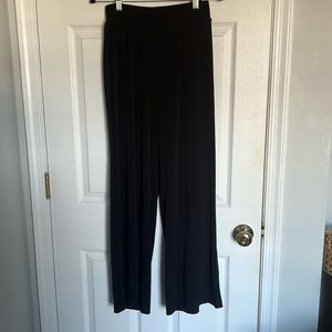 Add to your wardrobe this look, wide-leg black pants by Lane Bryant.